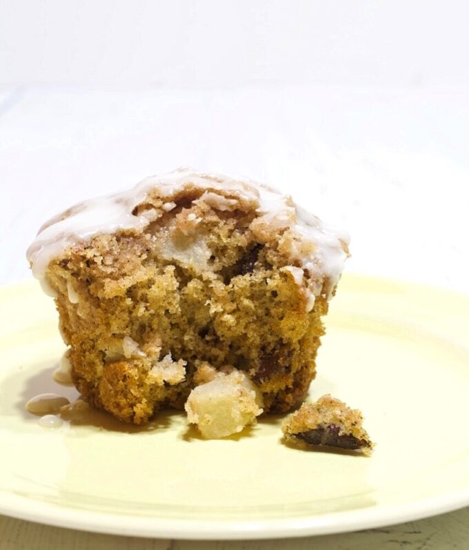 Apple crumb muffins with vanilla glaze.