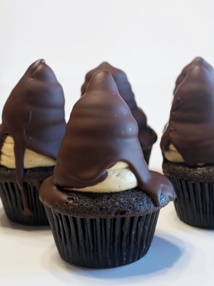 Chocolate and peanut butter hi-hat cupcakes with chocolate ganache.
