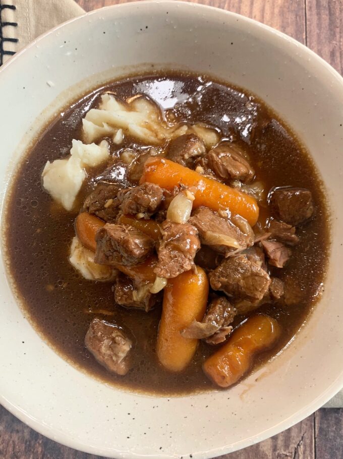 A bowl of Crockpot Beef Tips and Gravy.