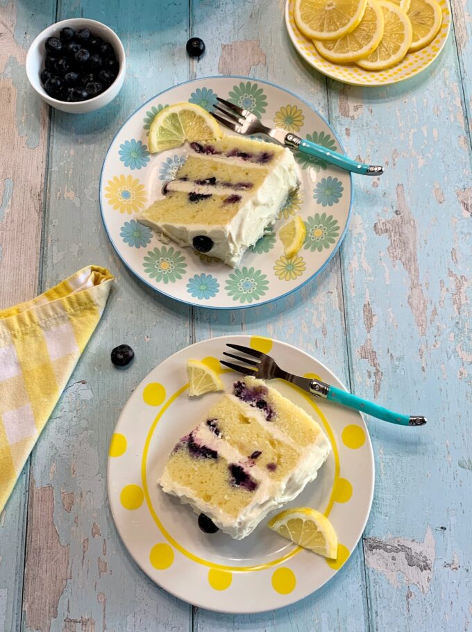 Slices of Lemon Blueberry Cake on dessert plates.