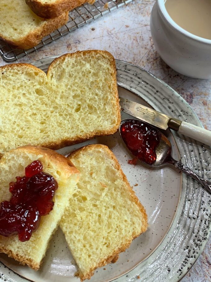 Sliced brioche bread with jam.