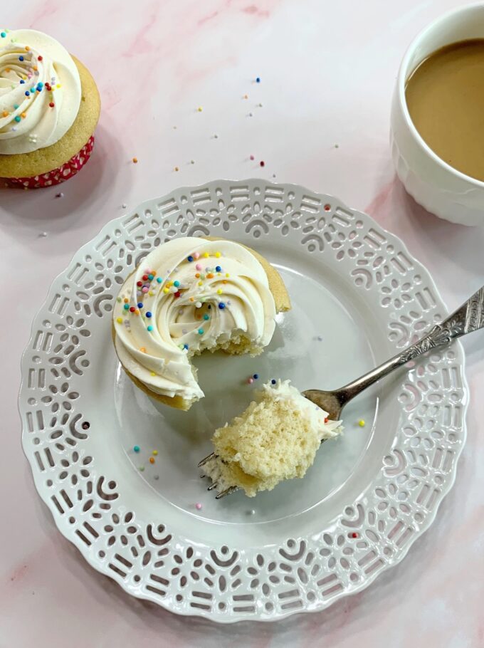 A cupcakes with cream cheese frosting.