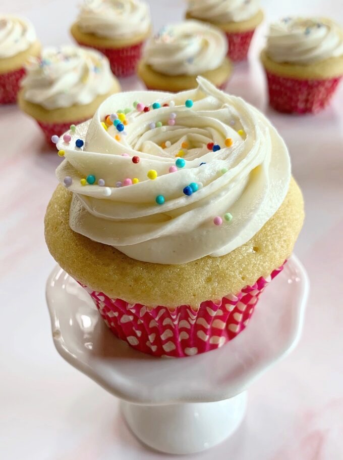 Cream cheese frosting on a cupcake.